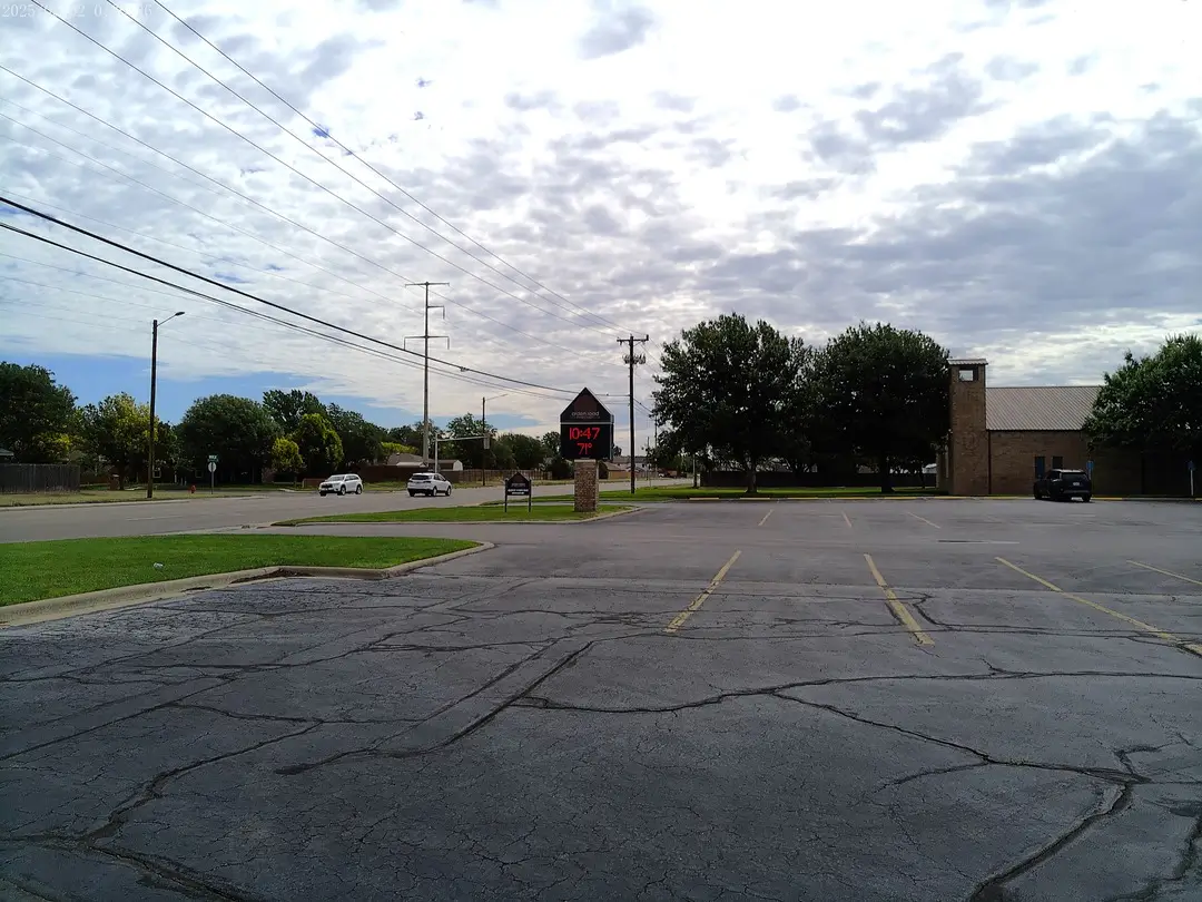 Arden Road Baptist Church seen across its parking lot