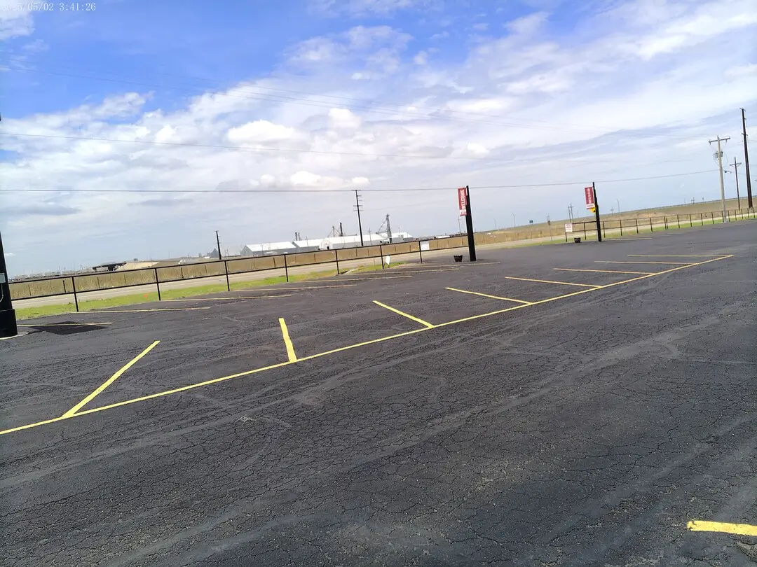 Paved parking lot along the Arena of Life Church property
