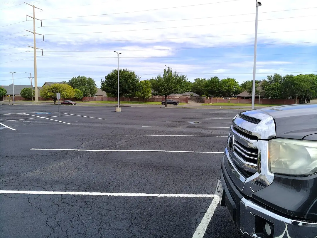 Newly striped parking area at Church of Christ of the Colonies