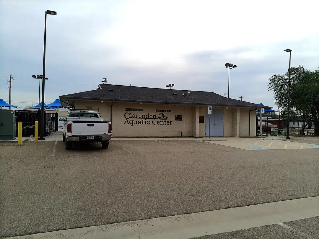 Entrance building and parking at the Clarendon Outdoor Aquatic Center in Clarendon, TX