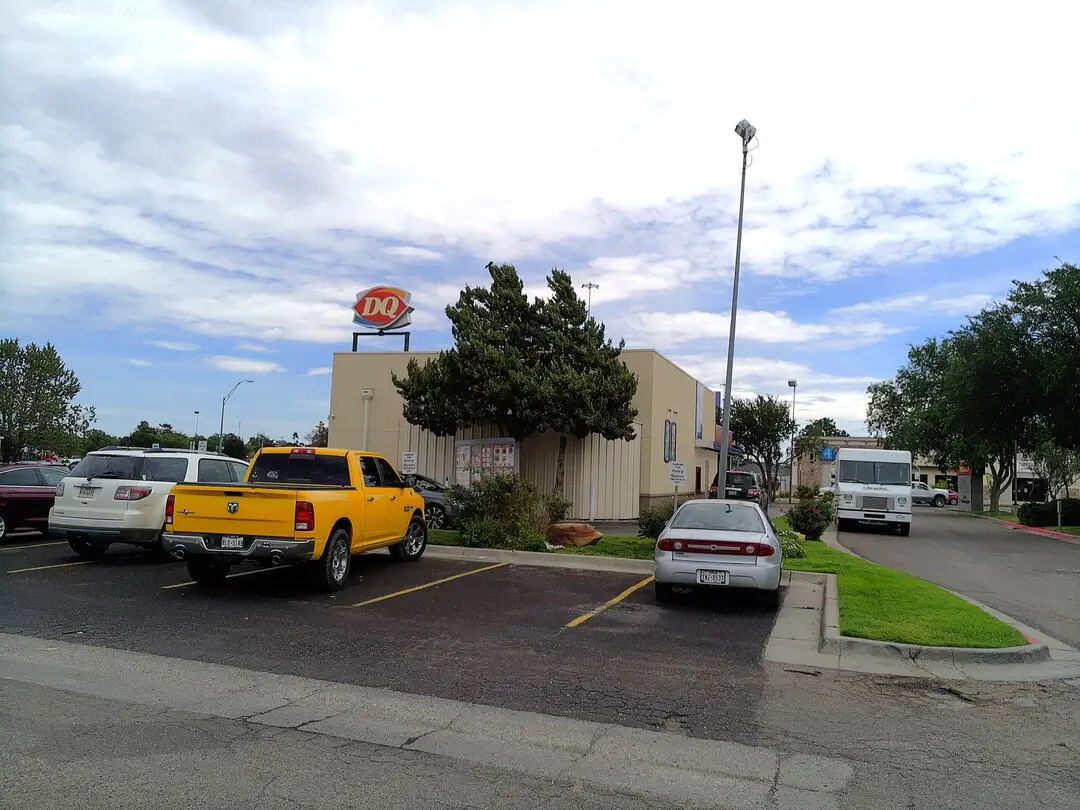Dairy Queen sign and parking lot on Washington Street
