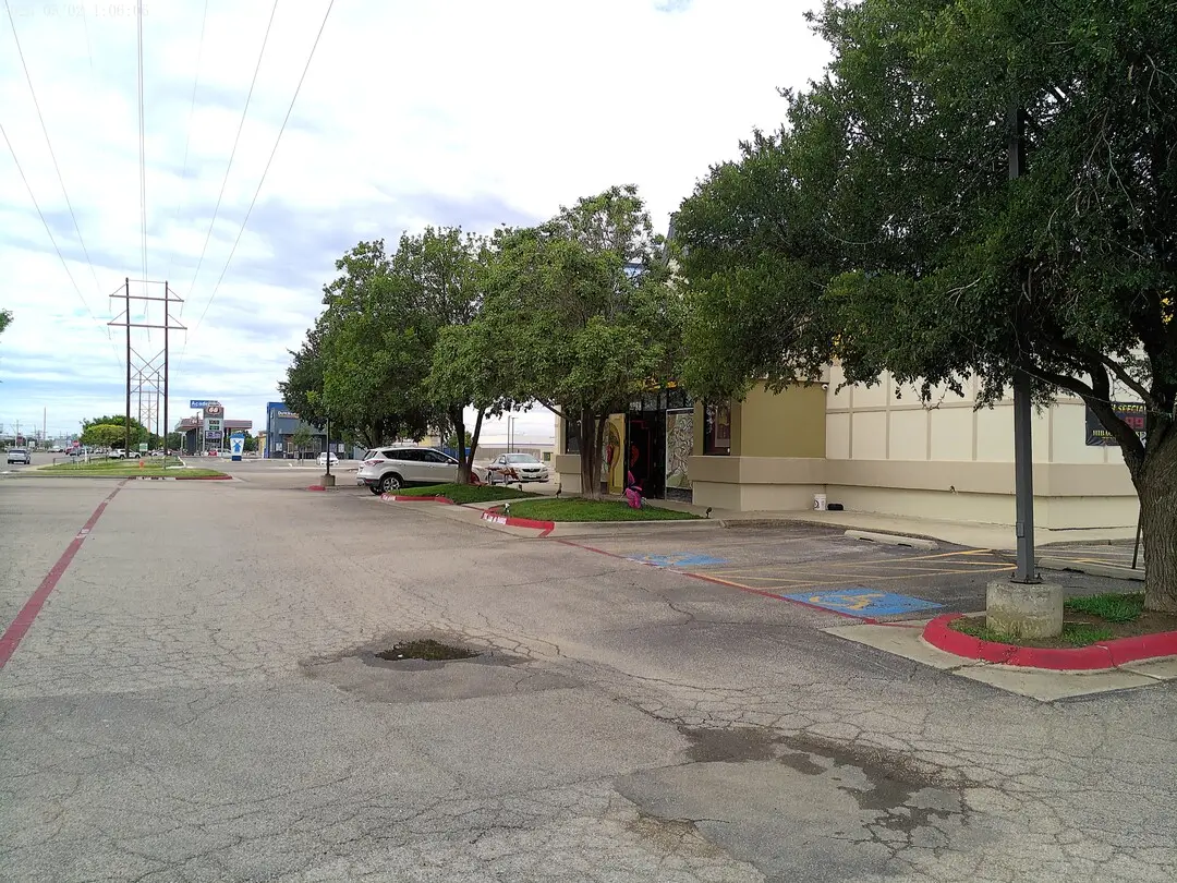 Parking lot and drive at Sakura Japanese Steak House