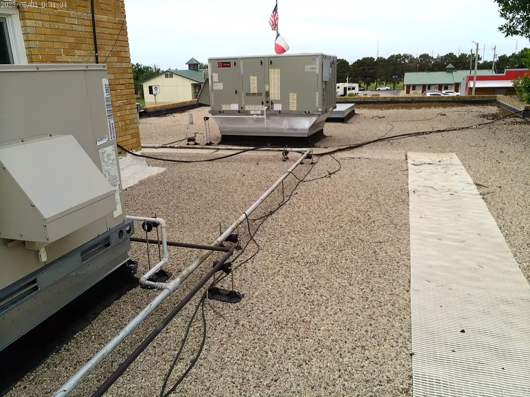 Rooftop HVAC unit and conduit on the Texas DPS building in Childress
